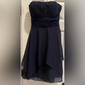 Navy strapless dress with sweetheart neckline. See comments regarding sizing!